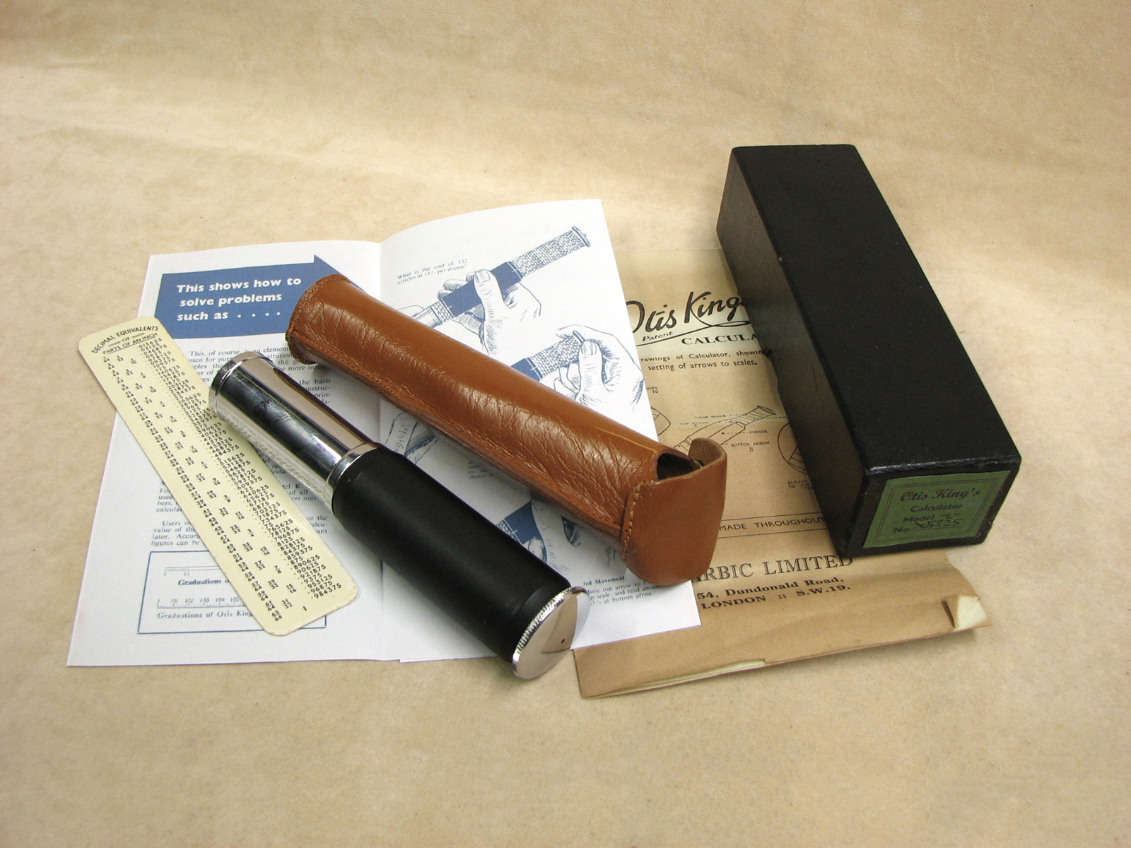 1960's Otis King Model L type C leather cased cylindrical slide rule calculator